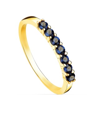 18K YELLOW GOLD RING WITH 7 BLUE CUBIC ZIRCONIA CLAWS. BODY WIDTH: 2 MM