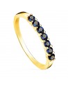 18K YELLOW GOLD RING WITH 7 BLUE CUBIC ZIRCONIA CLAWS. BODY WIDTH: 2 MM