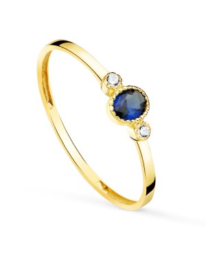 18K SORTIJA ORO AMARILLO PIEDRA AZUL Y CIRCONITAS 4 X 3 MM. ANCHO CUERPO: 1,2MM